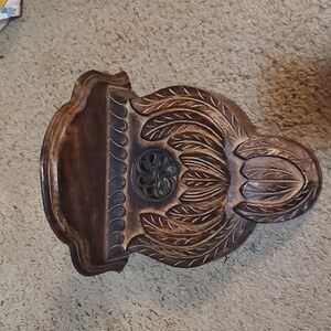 Hand carved mango wood sconce. Made in India